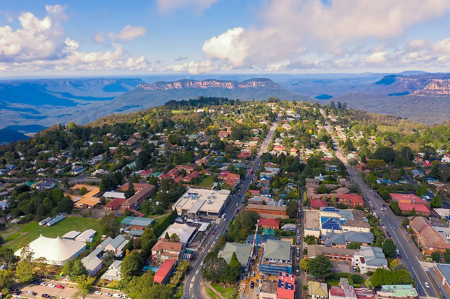 Aerial image of suburban neighbourhood with mountains in the background