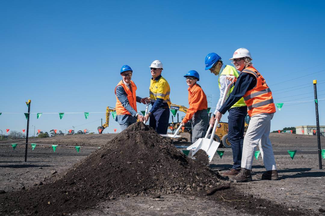 5 people shovelling the first sod at the Steel River East Battery project